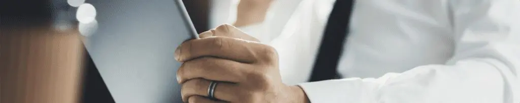 close up of person holding a mobile phone or tablet