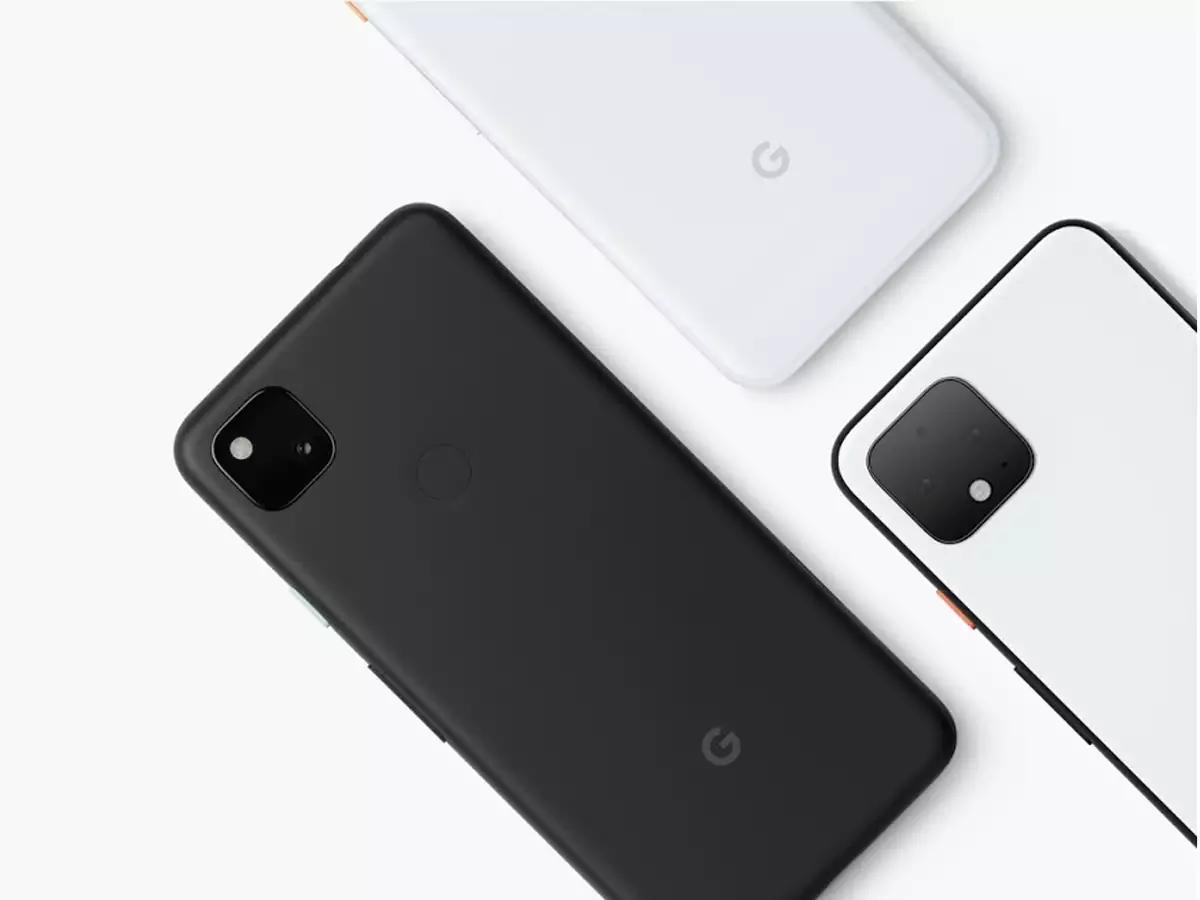 Three Google Pixel phones in black and white, showcasing the Android 12 design.